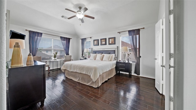 13703 View Meadow Ln, Houston, TX 77034 - bedroom featuring vaulted ceiling, dark wood-type flooring, a ceiling fan, and baseboards