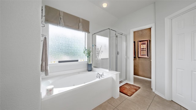 13703 View Meadow Ln, Houston, TX 77034 - bathroom with a bath, a stall shower, tile patterned floors, and baseboards