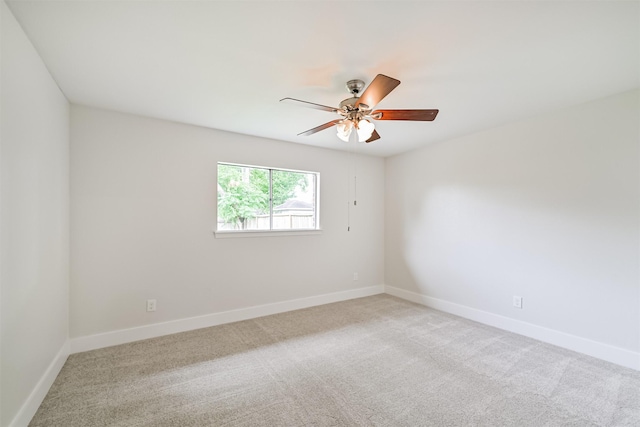 1210 E Rutgers Ln, Deer Park, TX 77536 - carpeted empty room with a ceiling fan and baseboards
