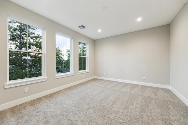 807 Martin St Unit D, Houston, TX 77018 - unfurnished room with plenty of natural light, baseboards, light colored carpet, and recessed lighting