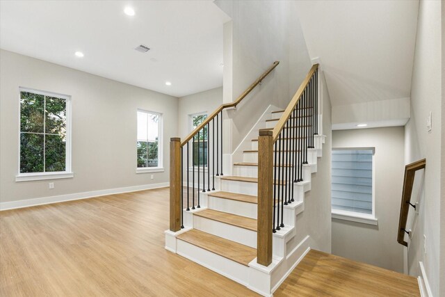 807 Martin St Unit D, Houston, TX 77018 - stairs featuring wood finished floors, recessed lighting, and baseboards