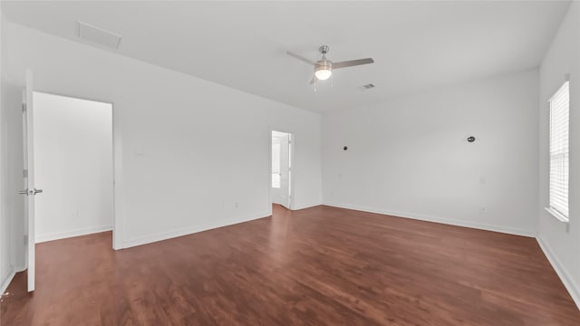 14304 Sweet Meadow Trl, Conroe, TX 77384 - spare room with wood finished floors, baseboards, and a ceiling fan