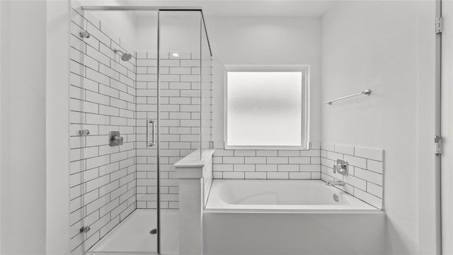 14304 Sweet Meadow Trl, Conroe, TX 77384 - full bathroom with a stall shower and a garden tub