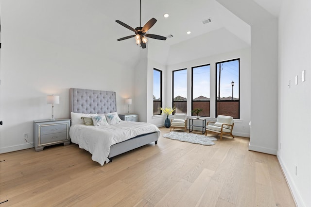 9114 Pleasant Grove Ct, Missouri City, TX 77459 - bedroom with light wood-style floors, baseboards, recessed lighting, ceiling fan, and high vaulted ceiling