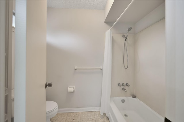 10722 Glenway Dr, Houston, TX 77070 - bathroom with shower / bath combo with shower curtain, toilet, baseboards, and tile patterned floors
