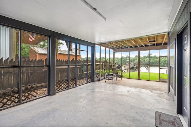 215 Selkirk Rd, Matagorda, TX 77414 - unfurnished sunroom with a water view