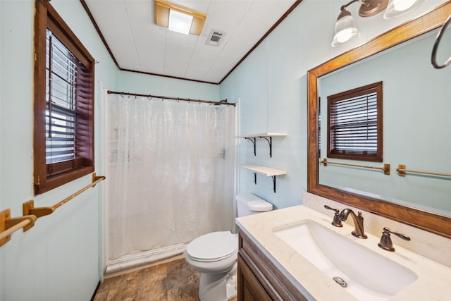 215 Selkirk Rd, Matagorda, TX 77414 - full bathroom with vanity, toilet, curtained shower, and ornamental molding