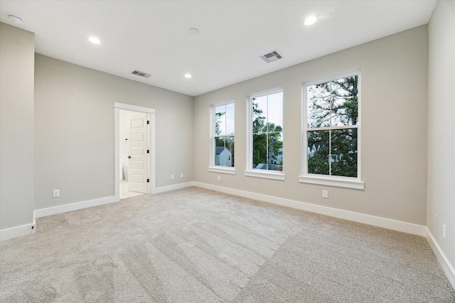807 Martin St Unit C, Houston, TX 77018 - empty room with baseboards, light colored carpet, recessed lighting, and a smoke detector