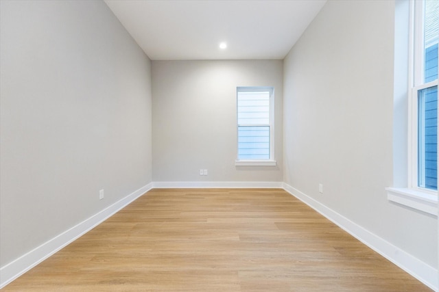 807 Martin St Unit C, Houston, TX 77018 - unfurnished room featuring baseboards, light wood-style floors, plenty of natural light, and recessed lighting