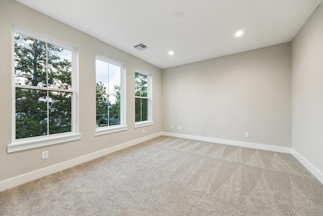 807 Martin St Unit C, Houston, TX 77018 - unfurnished room with plenty of natural light, baseboards, light colored carpet, and recessed lighting