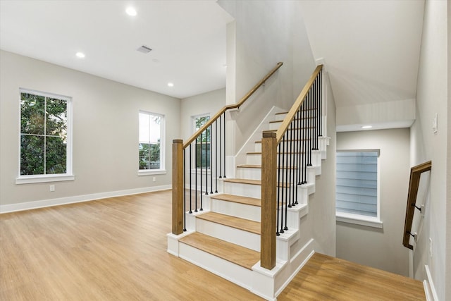 807 Martin St Unit C, Houston, TX 77018 - stairs featuring wood finished floors, recessed lighting, and baseboards