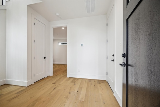 2209 Dennis St, Houston, TX 77004 - unfurnished bedroom with light wood-type flooring and baseboards