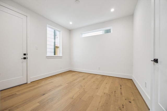 2209 Dennis St, Houston, TX 77004 - unfurnished room featuring light wood-style flooring, baseboards, and recessed lighting
