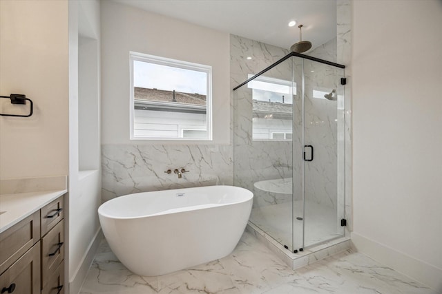 2209 Dennis St, Houston, TX 77004 - bathroom featuring marble finish flooring, a marble finish shower, a soaking tub, and vanity