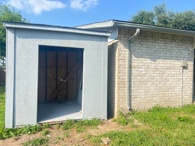 15730 Corsair Rd, Houston, TX 77053 - view of side of home with brick siding and stucco siding