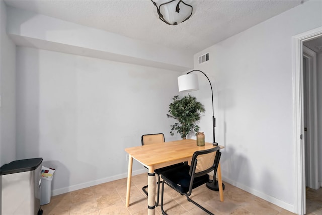1311 Antoine Dr Unit 254, Houston, TX 77055 - home office with a textured ceiling and baseboards