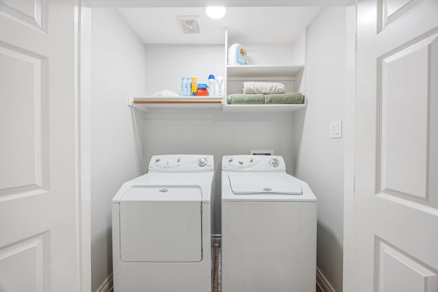 5741 Kansas St, Houston, TX 77007 - laundry area featuring washer and clothes dryer
