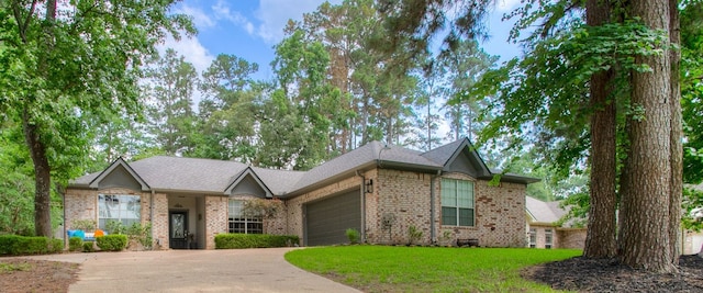 1912 Rollingwood Dr, Huntsville, TX 77340 - ranch-style house featuring concrete driveway, an attached garage, brick siding, and a front yard