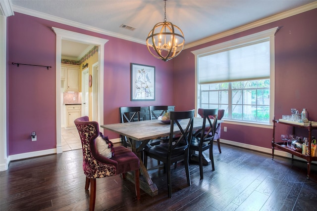 1912 Rollingwood Dr, Huntsville, TX 77340 - dining space with a chandelier, baseboards, dark wood-type flooring, and ornamental molding