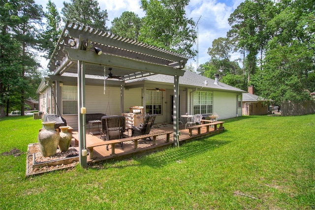 1912 Rollingwood Dr, Huntsville, TX 77340 - back of house with a ceiling fan, a lawn, a pergola, and an outdoor living space