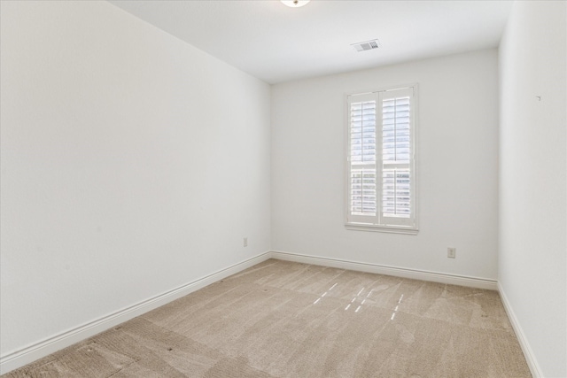 35 Daffodil Meadow Pl, Tomball, TX 77375 - unfurnished room featuring light carpet and baseboards