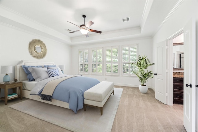 35 Daffodil Meadow Pl, Tomball, TX 77375 - bedroom featuring a tray ceiling, light carpet, crown molding, ceiling fan, and baseboards