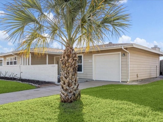 7205 Yucca Dr, Galveston, TX 77551 - ranch-style home with an attached garage