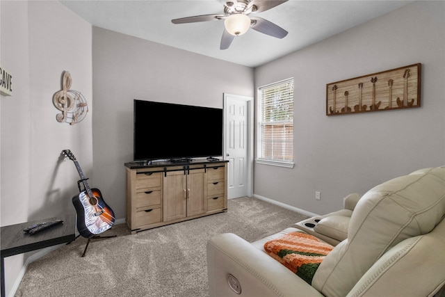 1608 Lark St, Alvin, TX 77511 - living area with light carpet, a ceiling fan, and baseboards
