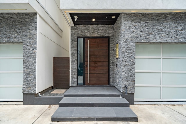 819 W 24th St Unit C, Houston, TX 77008 - view of exterior entry featuring stone siding