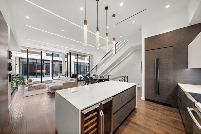819 W 24th St Unit C, Houston, TX 77008 - kitchen with modern cabinets, dark wood-type flooring, light countertops, a center island, and recessed lighting