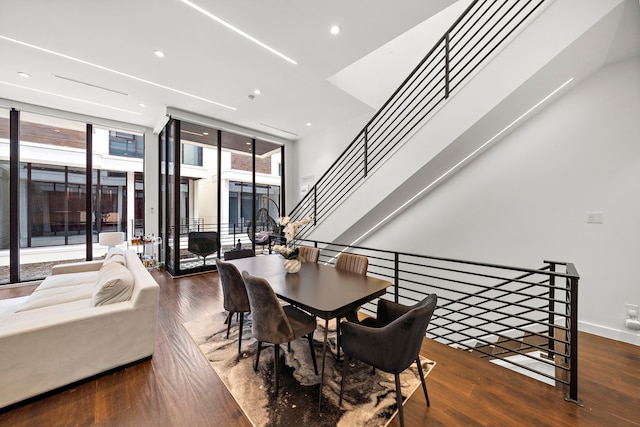 819 W 24th St Unit C, Houston, TX 77008 - dining area with wood finished floors, recessed lighting, stairway, and baseboards