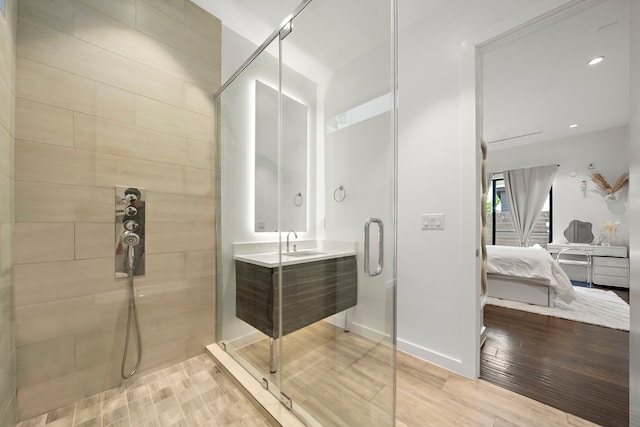 819 W 24th St Unit C, Houston, TX 77008 - full bath featuring a stall shower, ensuite bathroom, wood finished floors, vanity, and recessed lighting