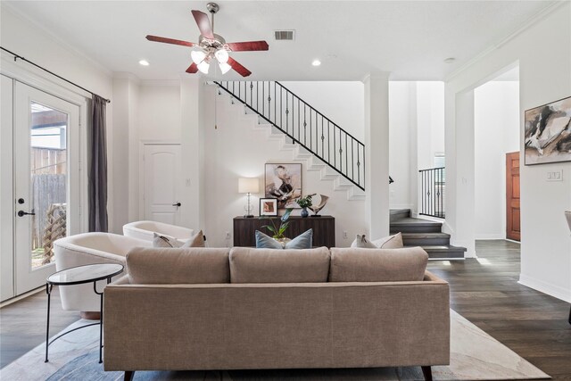 3615 Hempstead Villa Dr, Houston, TX 77008 - living room with plenty of natural light, stairs, dark wood-style floors, ceiling fan, and ornamental molding