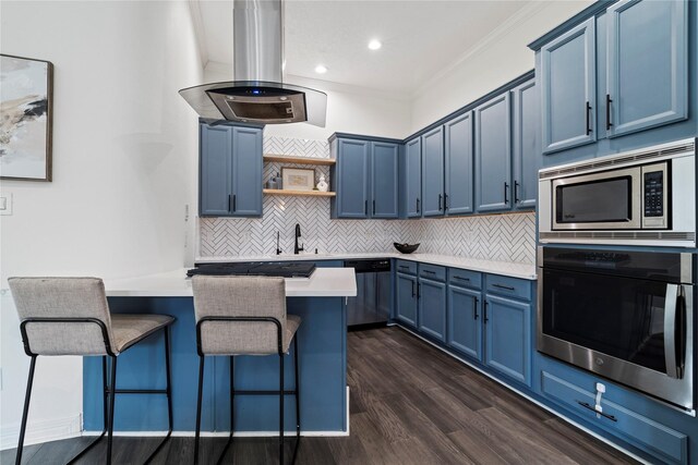 3615 Hempstead Villa Dr, Houston, TX 77008 - kitchen with blue cabinets, stainless steel appliances, island exhaust hood, a kitchen breakfast bar, and open shelves
