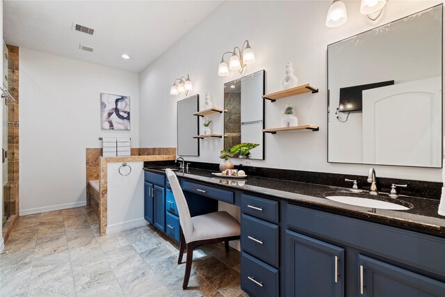3615 Hempstead Villa Dr, Houston, TX 77008 - bathroom with double vanity, baseboards, and a bath