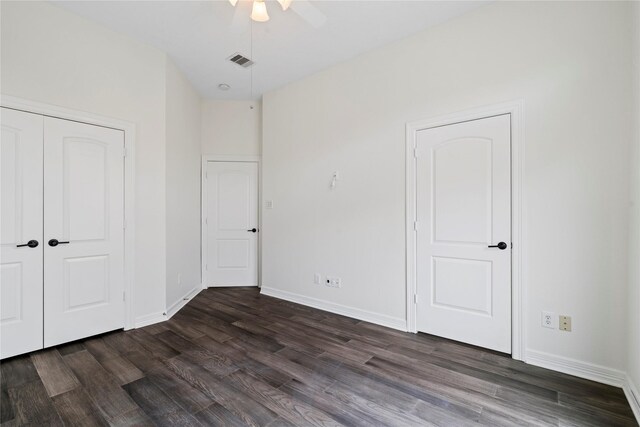 3615 Hempstead Villa Dr, Houston, TX 77008 - unfurnished bedroom featuring dark wood-style flooring, baseboards, and a closet
