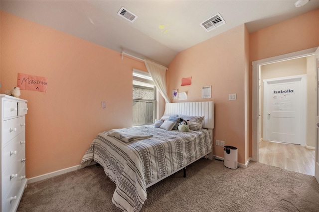 4607 Primrose Valley Ln, Fulshear, TX 77441 - carpeted bedroom featuring baseboards and lofted ceiling