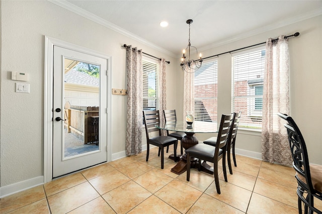 17422 Ebeys Landing Ln, Humble, TX 77346 - dining space with crown molding, a chandelier, plenty of natural light, light tile patterned floors, and baseboards