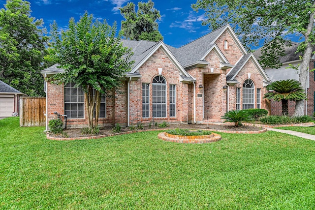 6614 Cypress Village Dr, Sugar Land, TX 77479 - traditional home with brick siding and roof with shingles