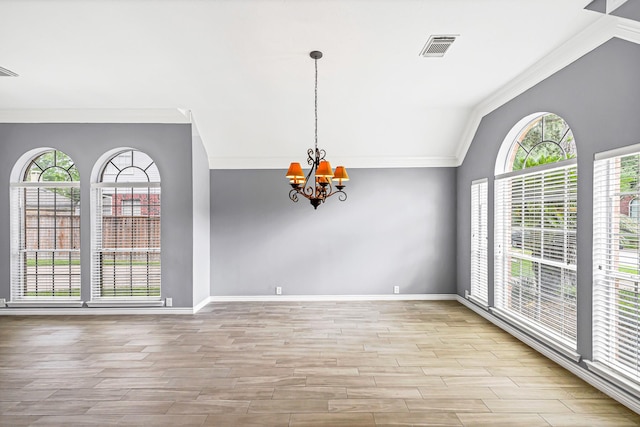 6614 Cypress Village Dr, Sugar Land, TX 77479 - unfurnished room featuring crown molding, a chandelier, wood finished floors, lofted ceiling, and baseboards