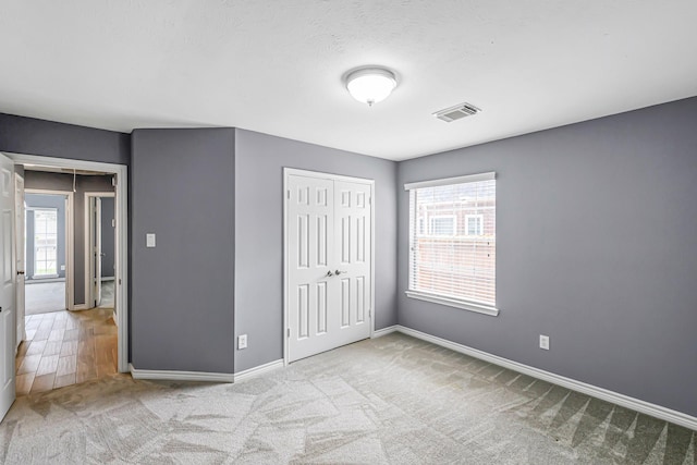 6614 Cypress Village Dr, Sugar Land, TX 77479 - unfurnished bedroom featuring carpet flooring, baseboards, and a closet