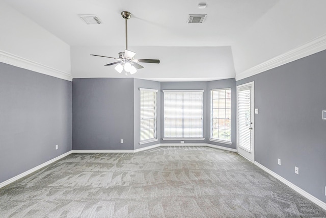 6614 Cypress Village Dr, Sugar Land, TX 77479 - carpeted empty room featuring plenty of natural light, vaulted ceiling, ceiling fan, and baseboards