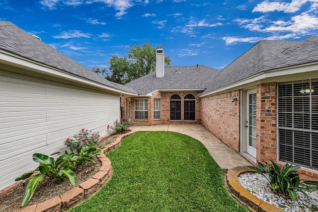 6614 Cypress Village Dr, Sugar Land, TX 77479 - view of grassy yard featuring a patio