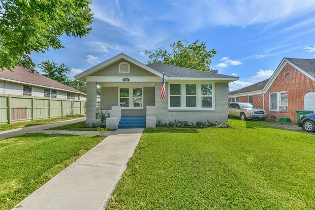 1522 Munger St, Houston, TX 77023 - view of front of home featuring brick siding and covered porch