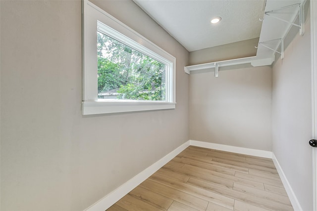 1522 Munger St, Houston, TX 77023 - spacious closet with wood finished floors