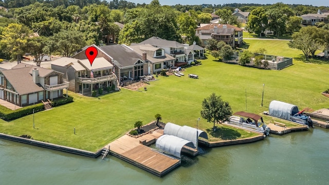 112 Cove Pt, Montgomery, TX 77356 - aerial view of residential area featuring a nearby body of water