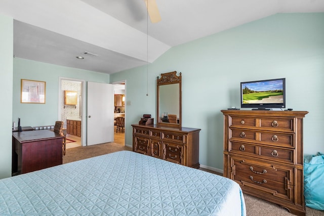 112 Cove Pt, Montgomery, TX 77356 - bedroom with vaulted ceiling, light carpet, connected bathroom, a ceiling fan, and baseboards