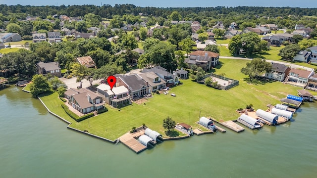 112 Cove Pt, Montgomery, TX 77356 - aerial perspective of suburban area with a large body of water