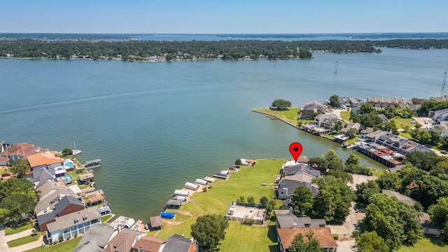 112 Cove Pt, Montgomery, TX 77356 - aerial perspective of suburban area with a nearby body of water