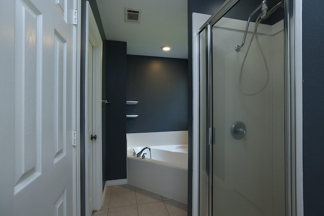 22719 Rainfern Dr, Magnolia, TX 77355 - full bathroom with a stall shower, tile patterned floors, and a garden tub